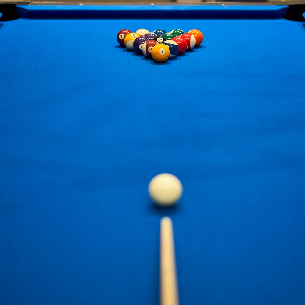 Pool table with a racked set of billiard balls